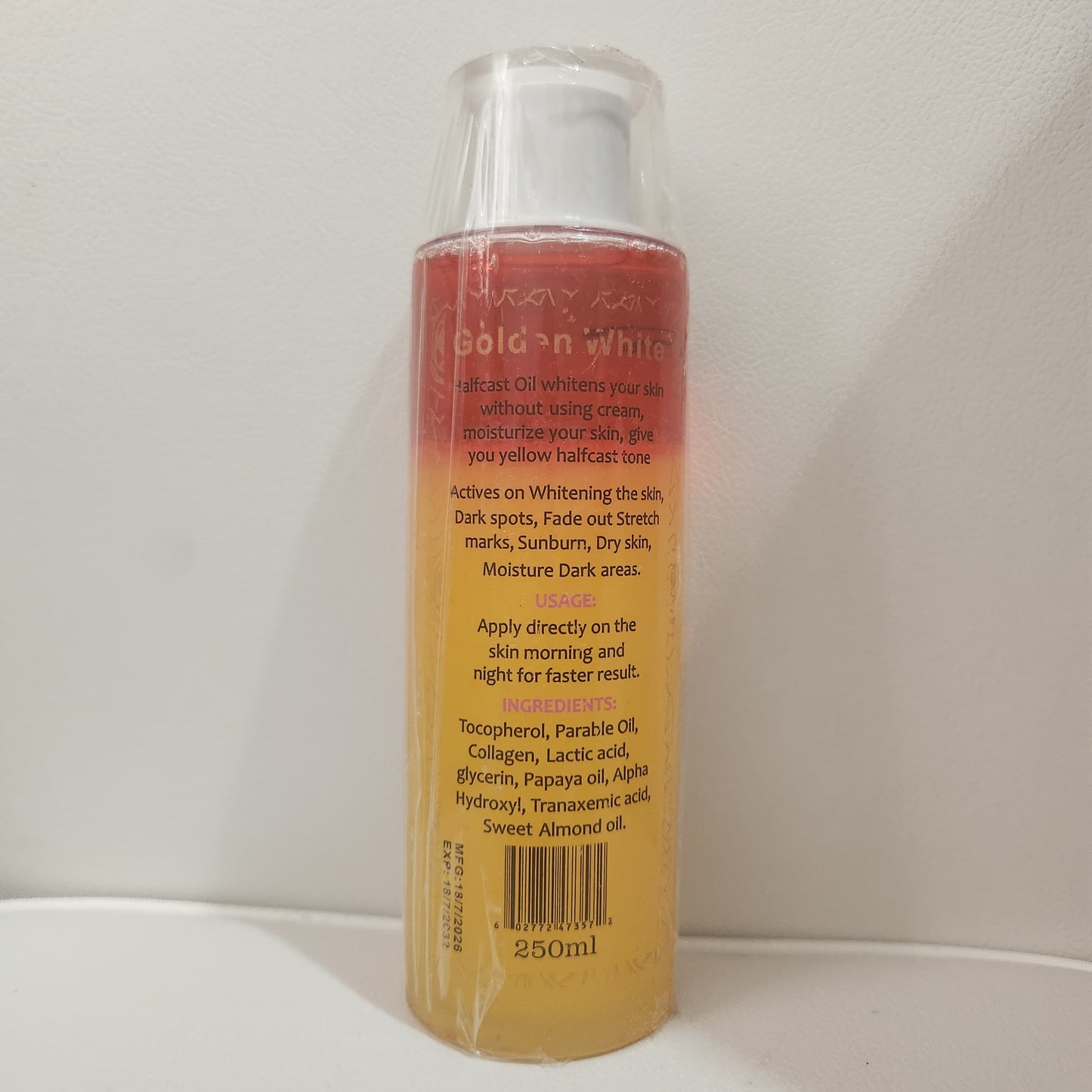 Golden white half cast oil body oil