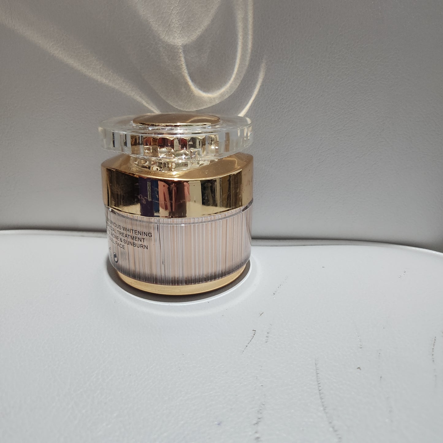 Glossy White Facial Cream - Luxurious Skincare for Radiant Complexion